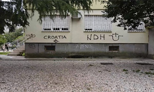 Symbols of “Blood and Honor” and “Combat 18” groups are written in the center of Prijedor.